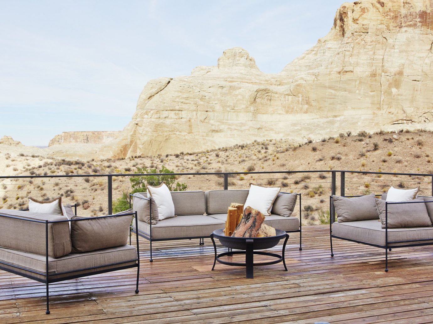 Lounge area on patio with view of desert scape