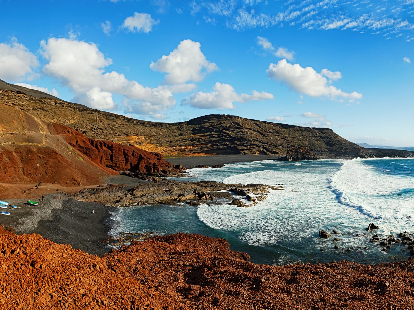 Panoramic view of El Golfo black sand beach near Green Lagoon in Lanzarote, Canary Islands.