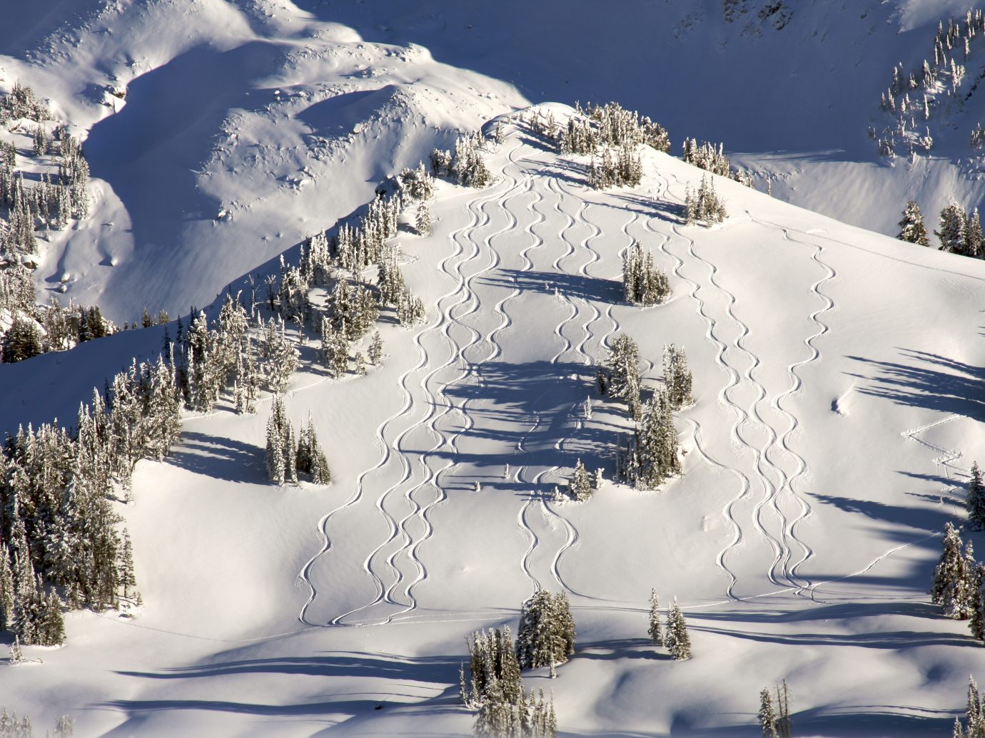 Backcountry skiers leave their mark in Grand Teton National Park.