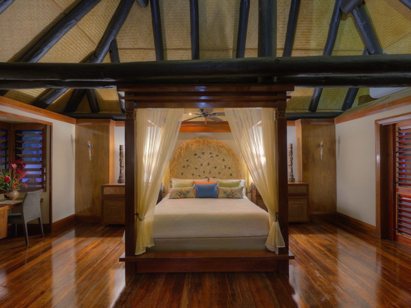 canopy bed in bedroom at Jean-Michel Cousteau Resort
