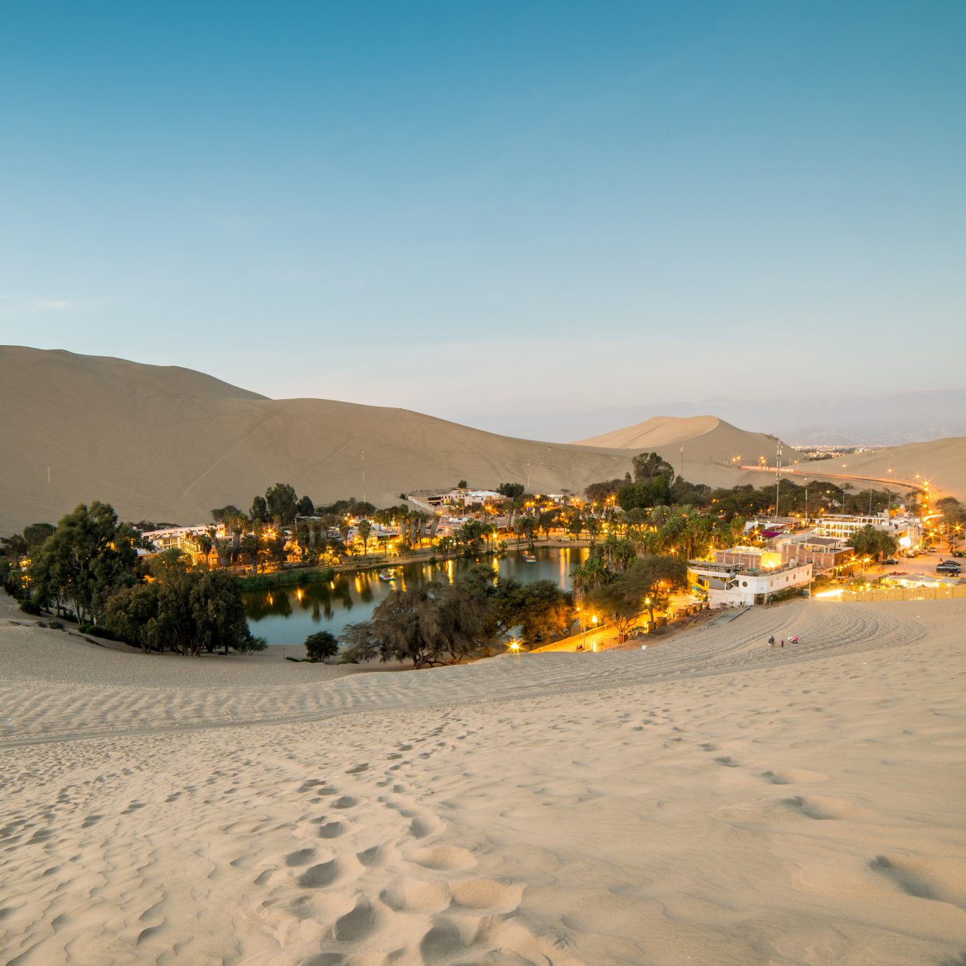 Oasis within the sand dunes of Ica in Huacachina