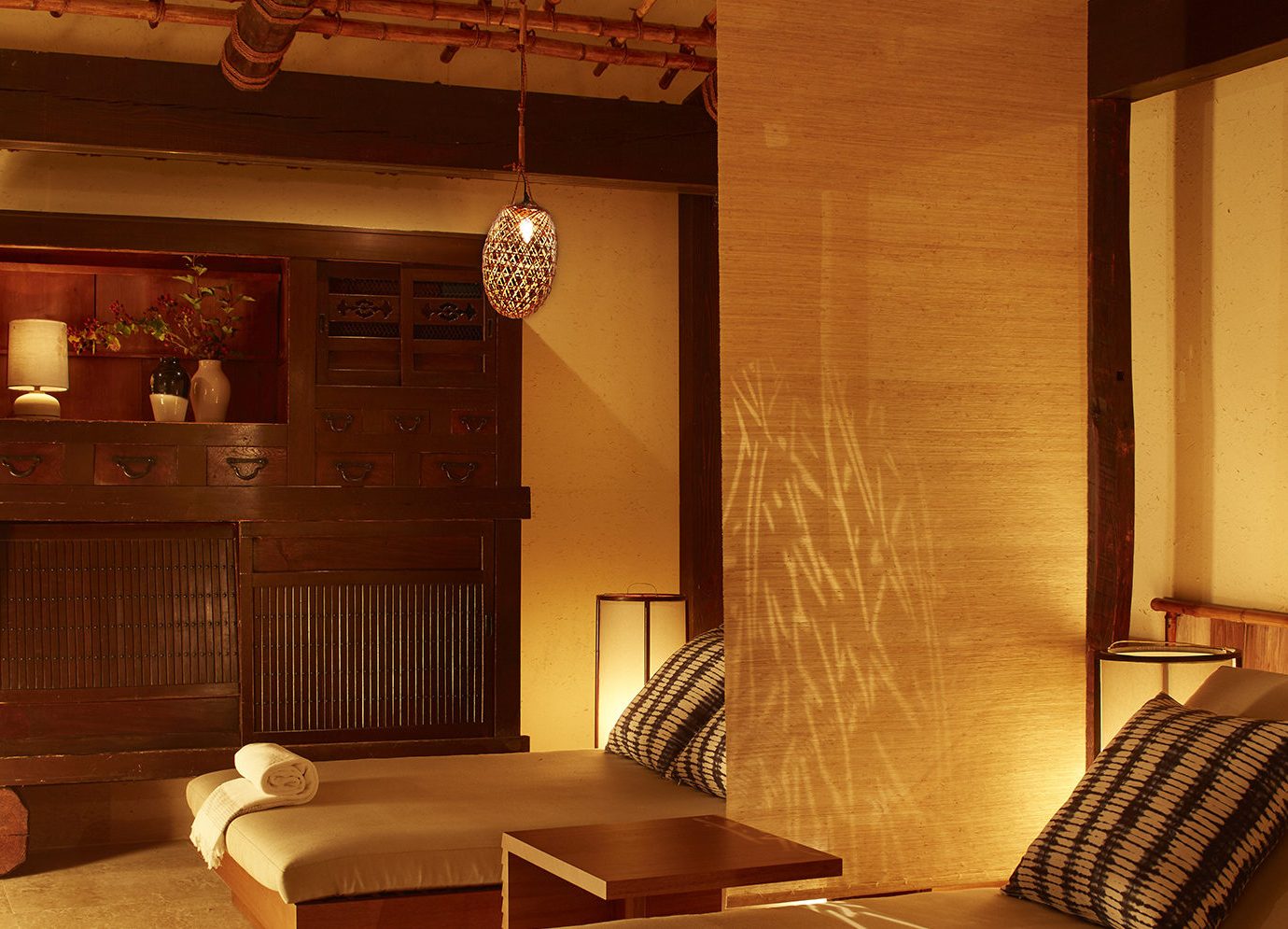 Relaxing warm toned bed space at Shibui spa