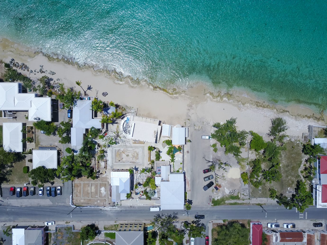 overhead view of the beach and hotel at The Fred