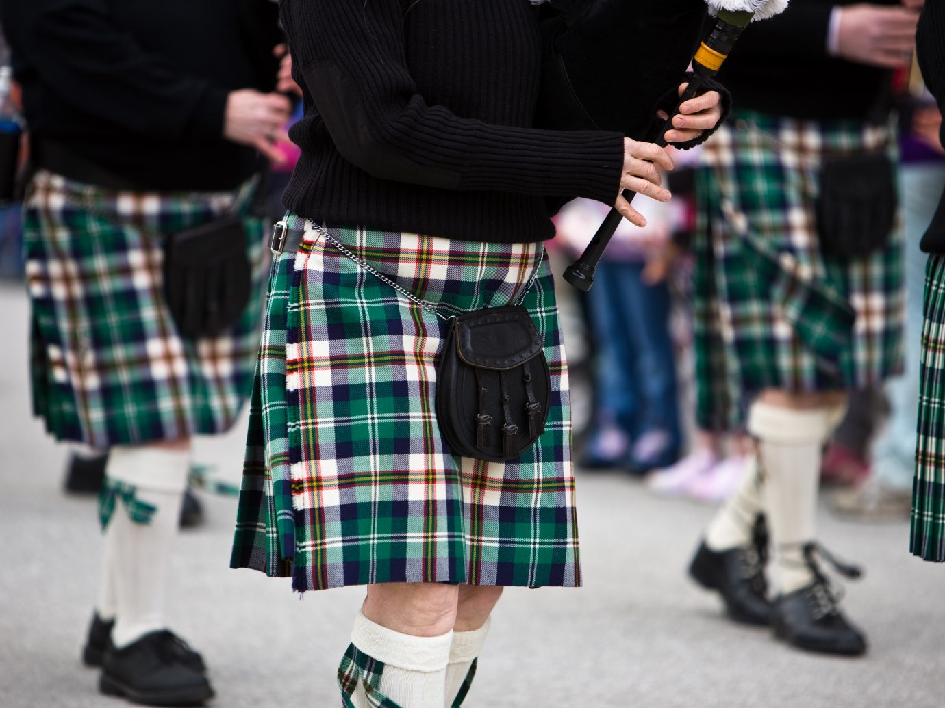 Bagpipers marching in a parade