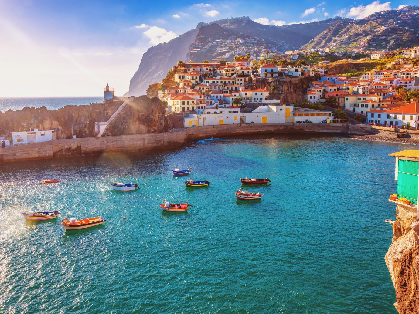 The beautiful fishing village of Camara de Lobos on the portugese Island of Madeira in warm evening sunshine light.