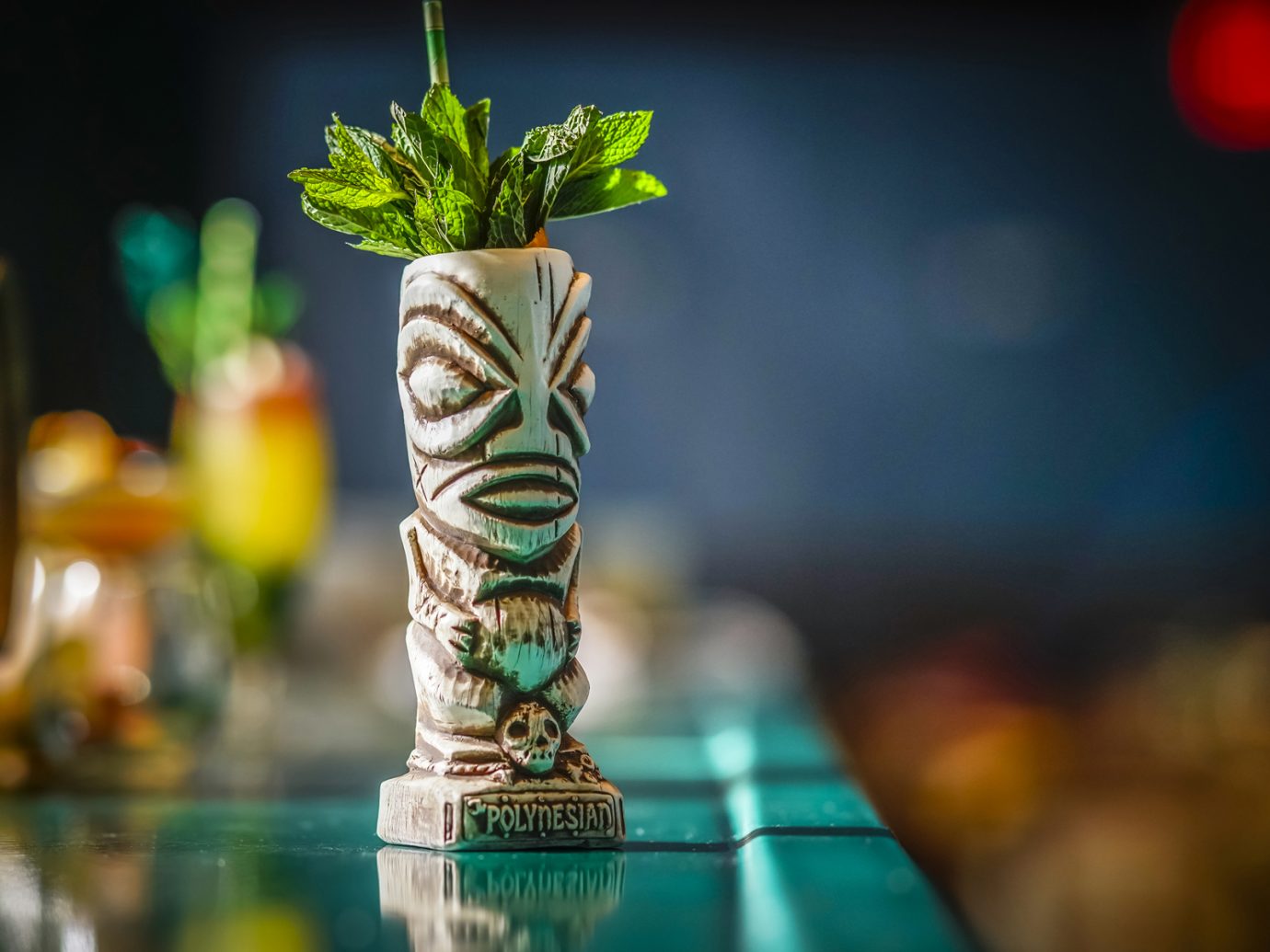 tiki drink with leaves sticking out