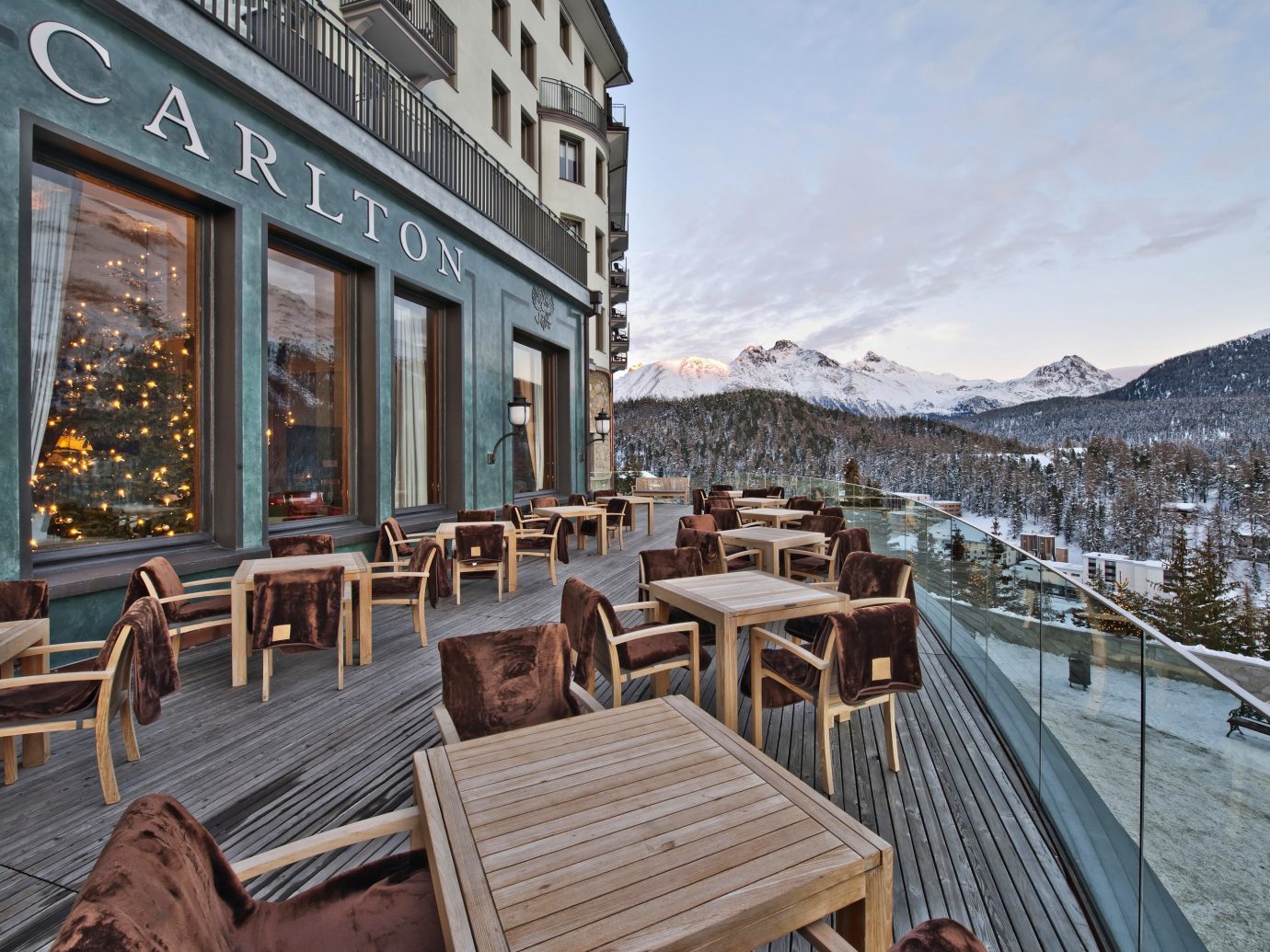 Tables on a deck at the Hotel Carlton in St. Moritz Switzerland