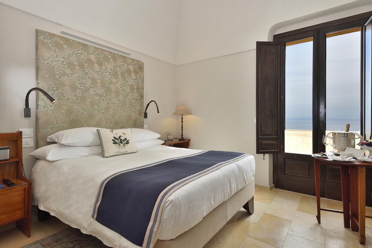 Bedroom at Monastero Santa Rosa Hotel & Spa
