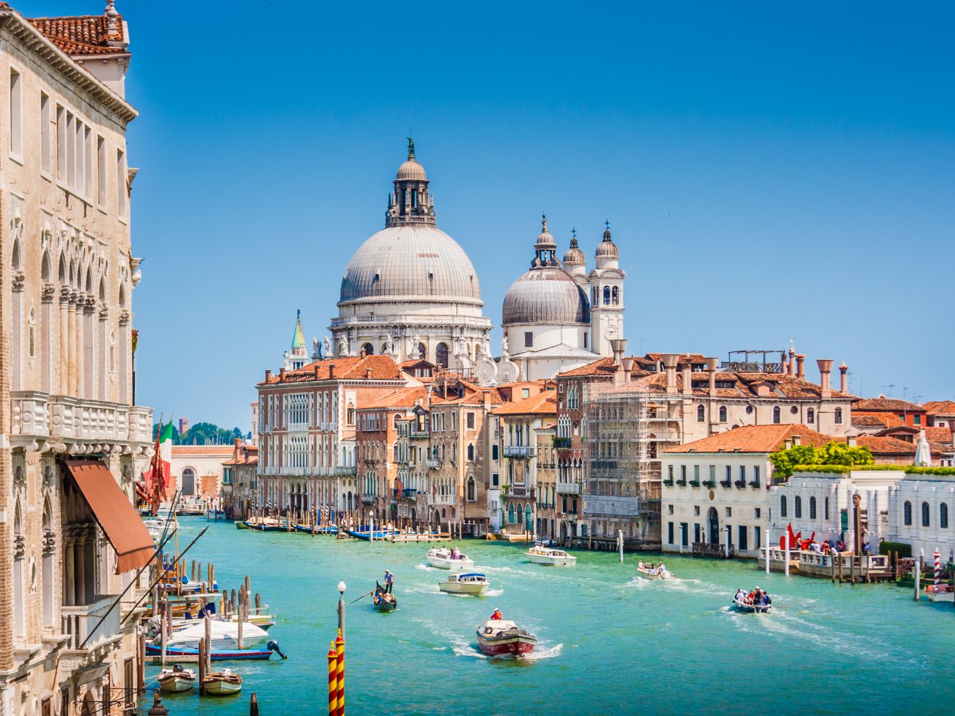 Beautiful view of famous Canal Grande with Basilica di Santa Maria della Salute, Venice, Italy.