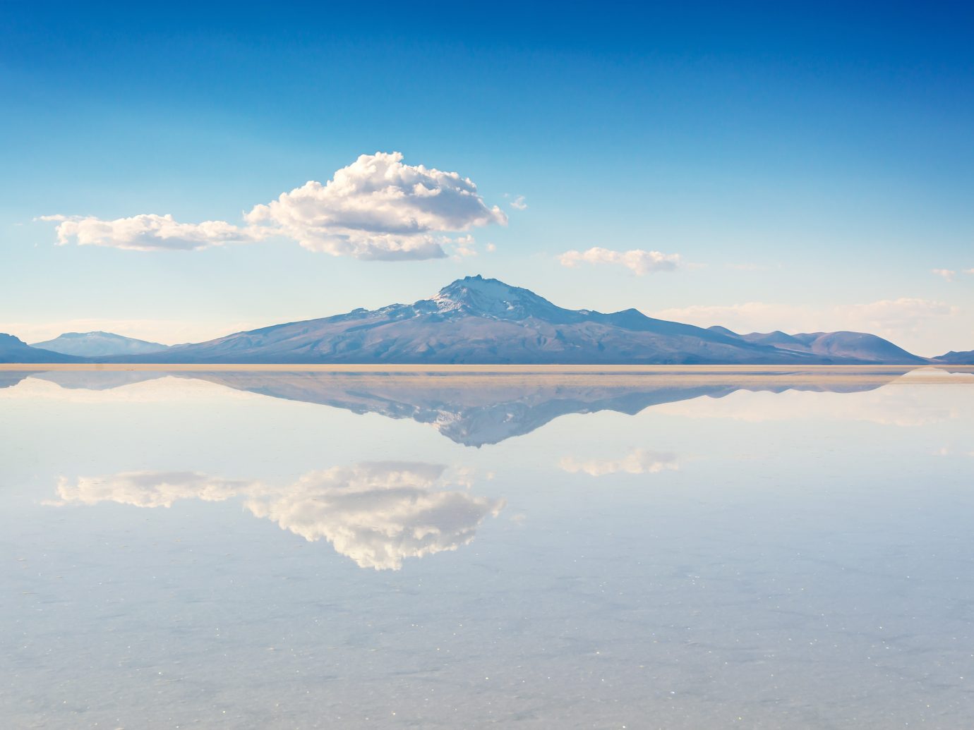 reflection of mountain in Salar de Uyuni (Uyuni salt flats), Potosi, Bolivia, South America