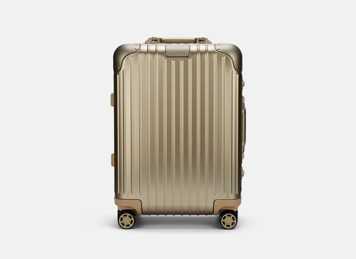 Rimowa rolling carry on gold