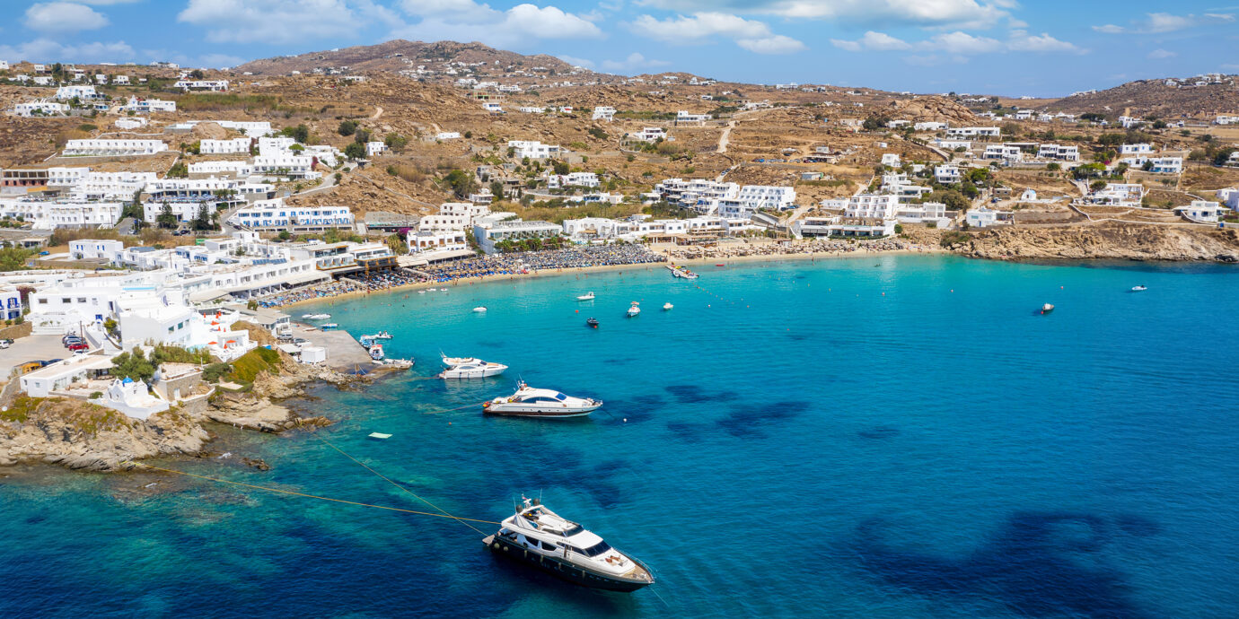 Aerial view to the popular Platis Gialos beach on the island of Mykonos, Cyclades, Greece