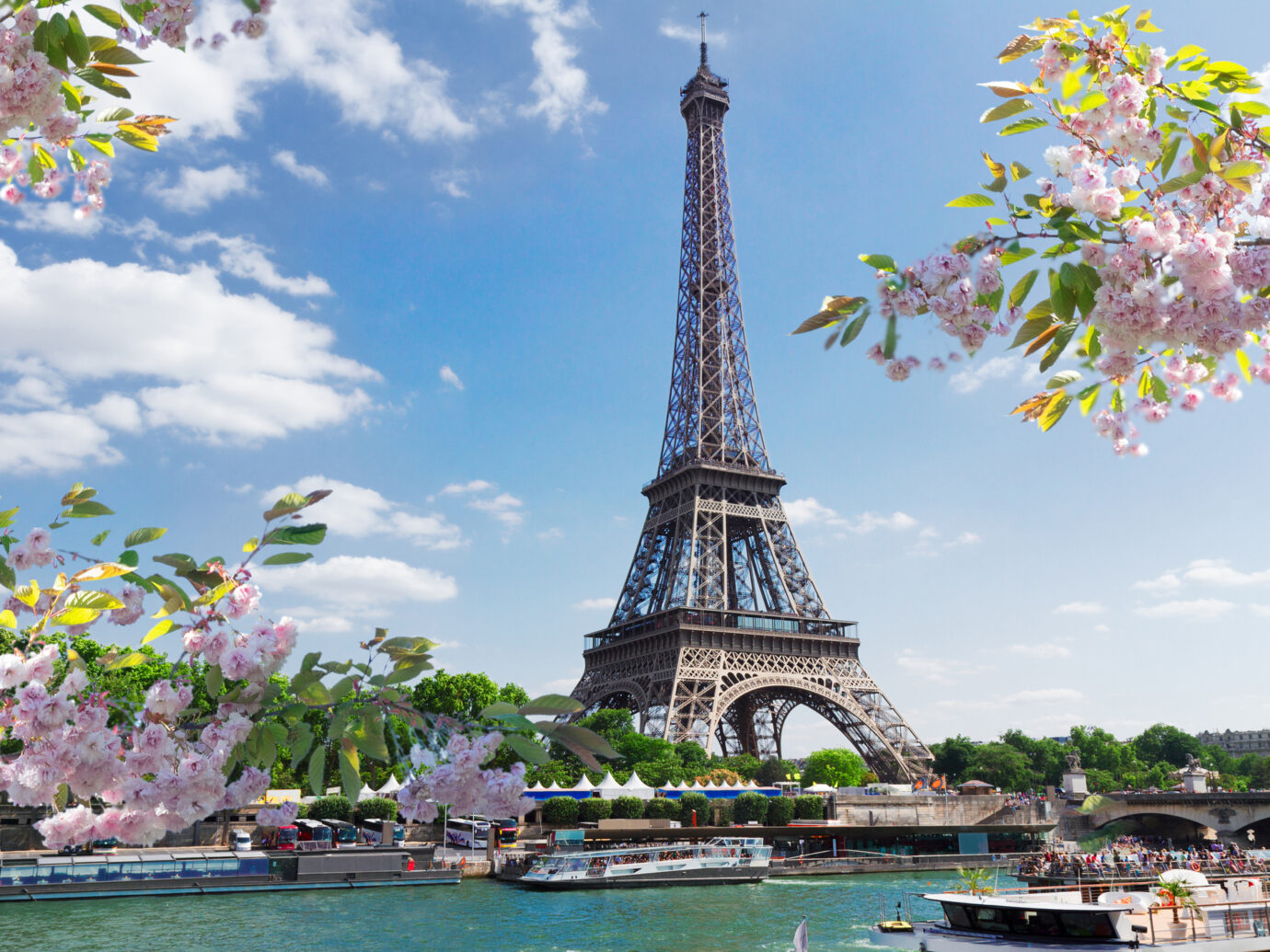 eiffel tour over Seine river waters at spring day, Paris, France