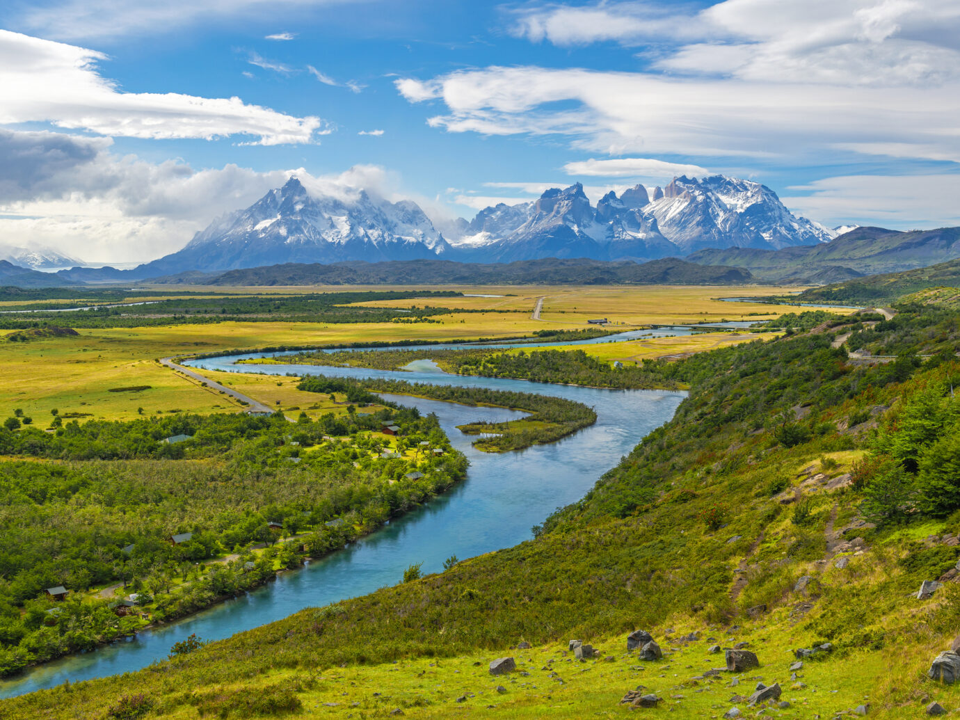 The Andes peaks of Paine Grande, Cuernos del Paine and Torres del Paine on a summer day