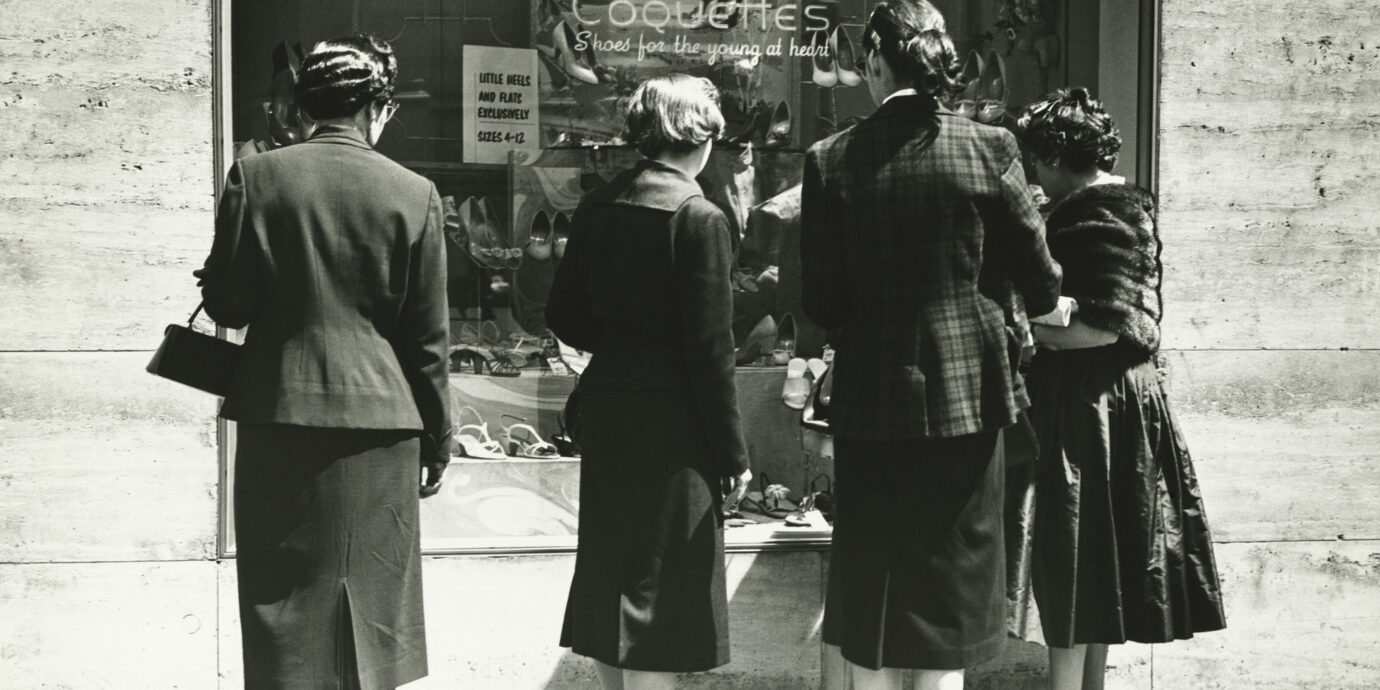 old fashioned photo of people window shopping