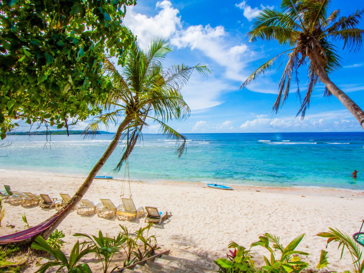 8 Surprisingly Tropical Vacations You Can Take Without a 