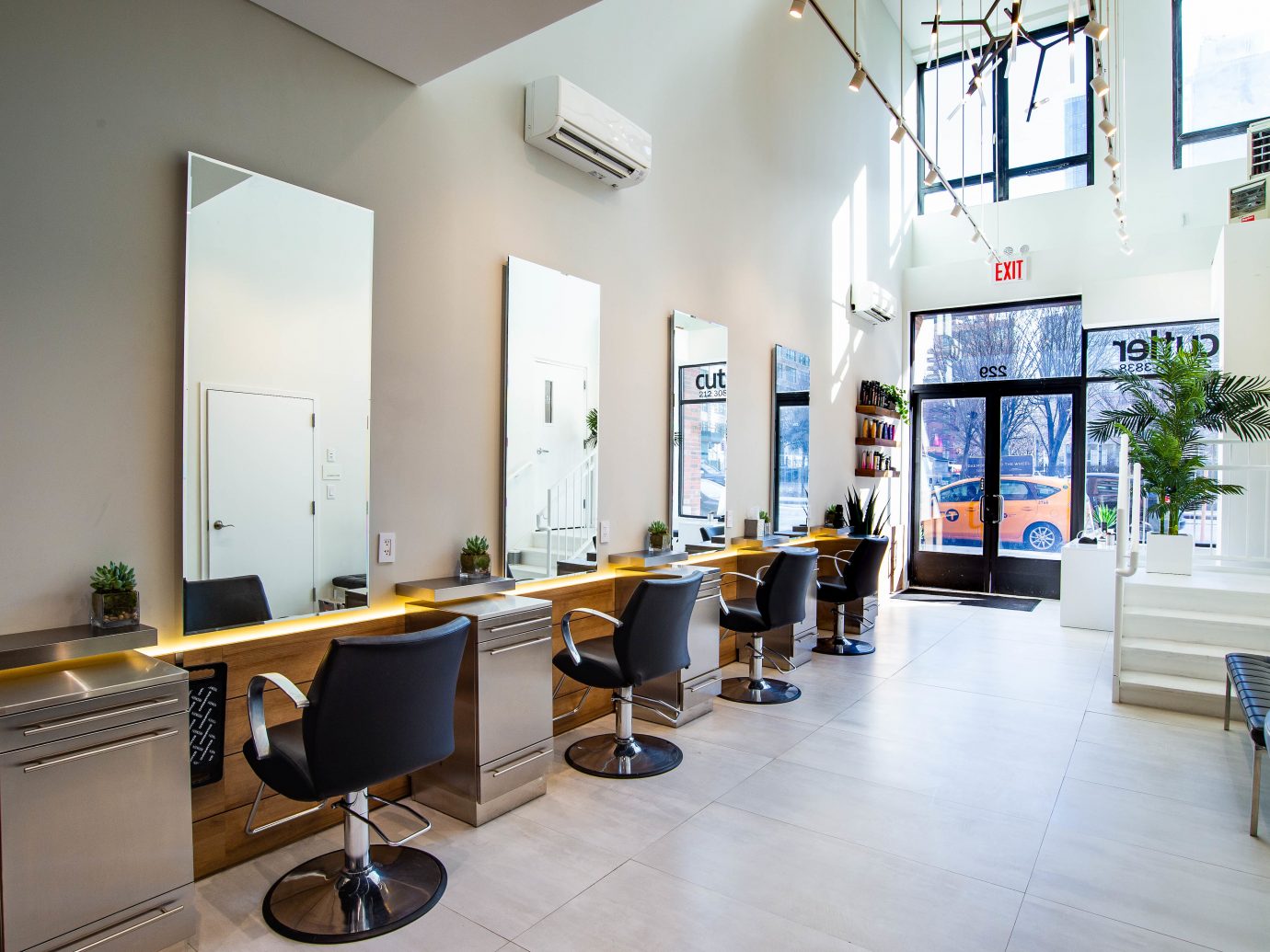 8. "The Top Hair Salons for Getting Dark Hair with Blue Tips" - wide 2